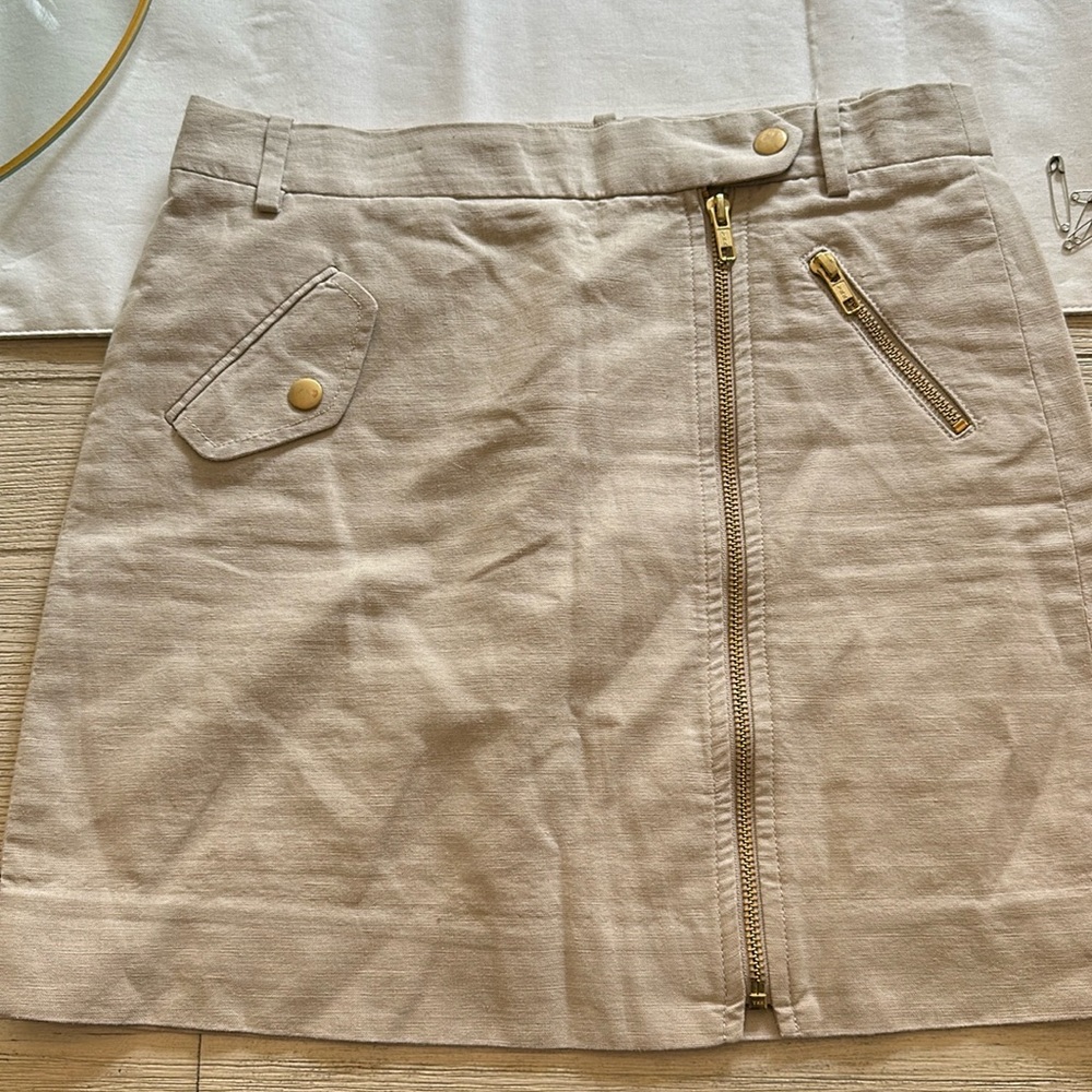 Zipper khaki skirt with gold zippers and buttons